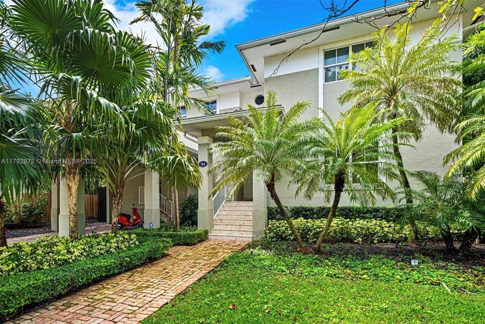 Located on one of the most desirable streets in Key Biscayne, 164 W Mashta Dr is a bright and spacious elevated home designed for family living and entertaining.