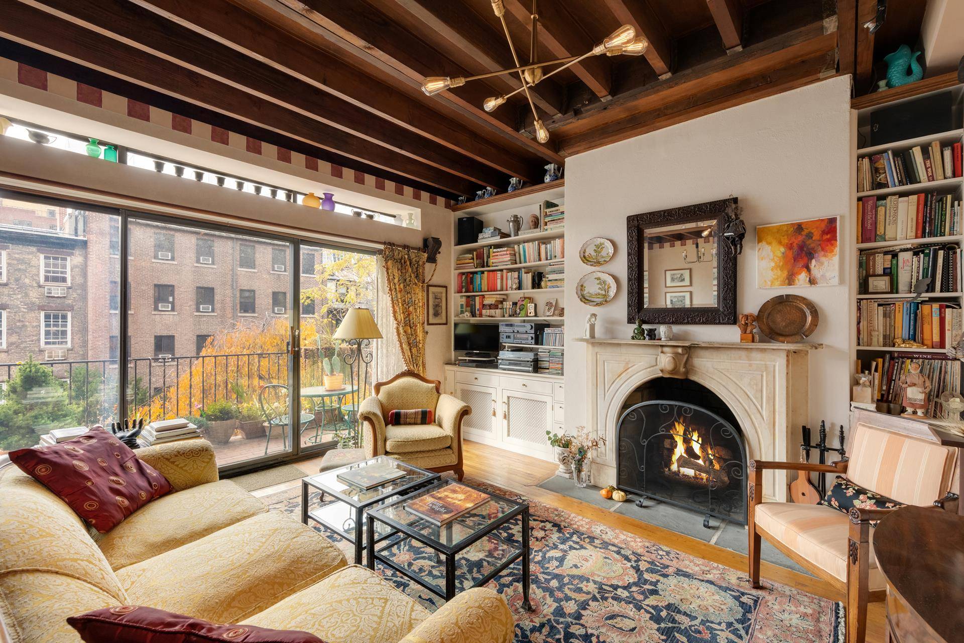 The soft crackle and heat emanating off the marble clad wood burning fireplace anchors a 22 foot wide southern facing great room in a custom renovated three bed, two and ...