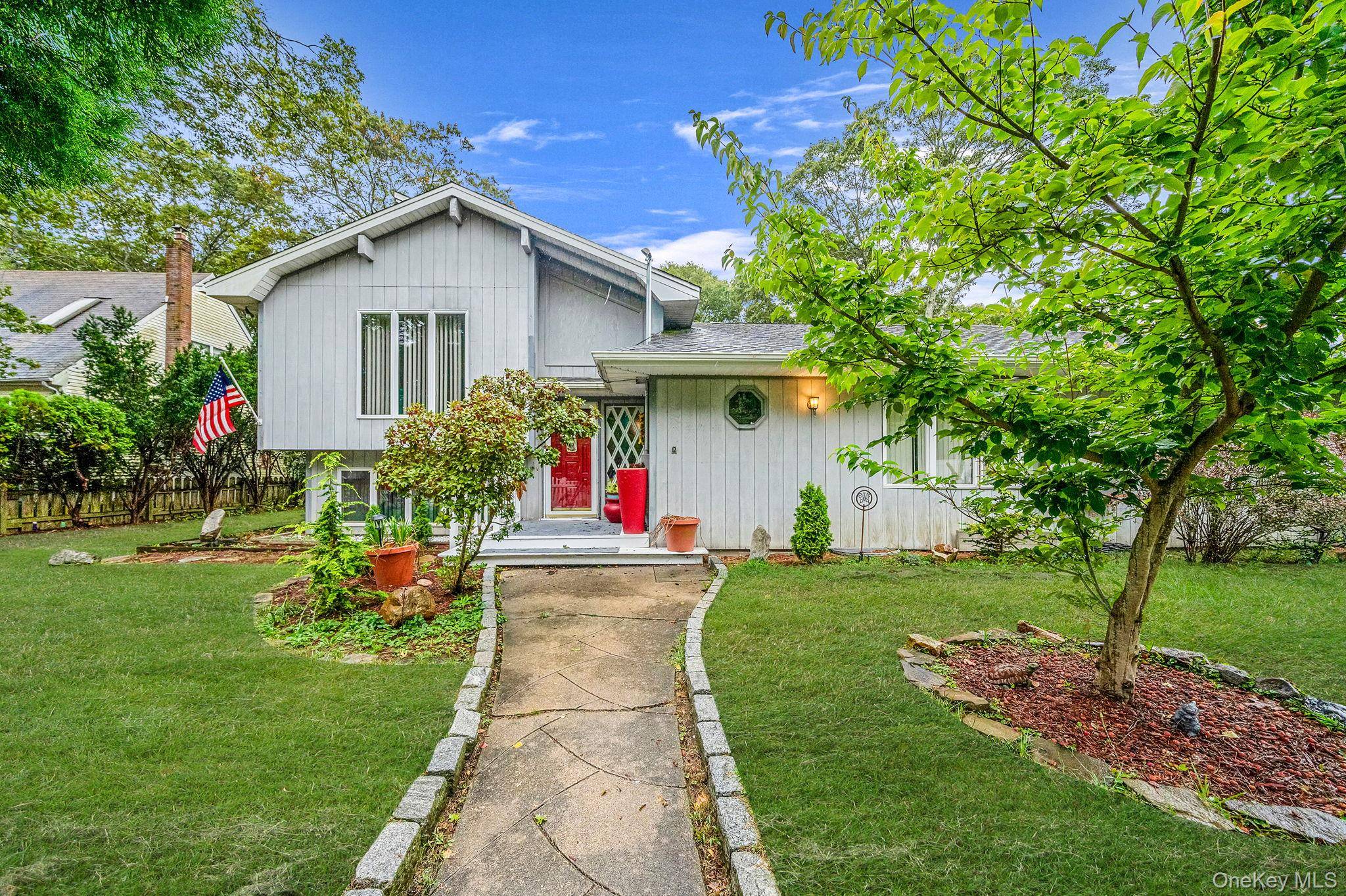 Welcome to 8 Claremont Drive, Mastic Beach.