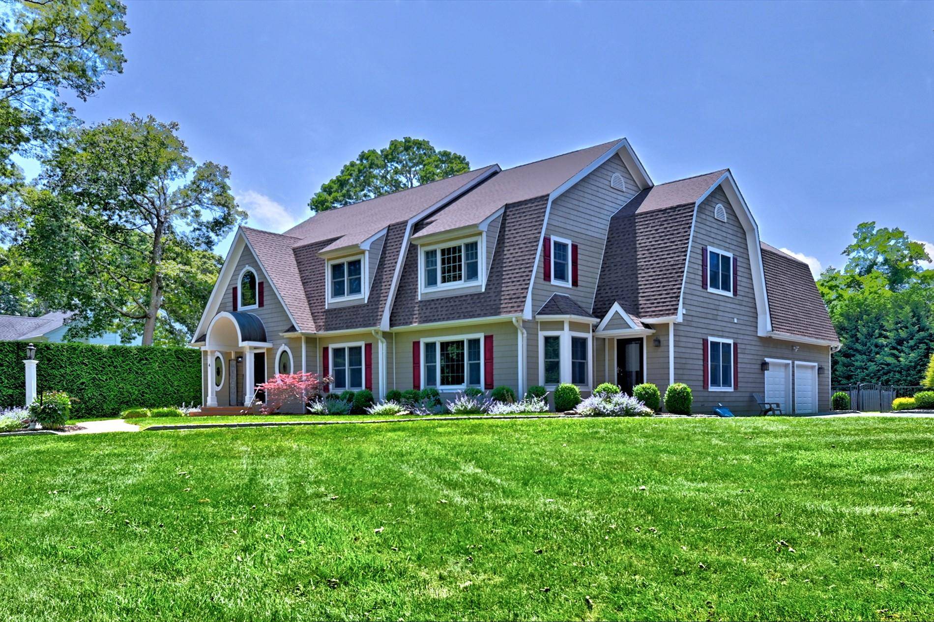 Welcome to an exceptionally maintained pristine home on the edge of the Hamptons where uncompromising craftmanship and serenity meets sophistication in East Moriches.