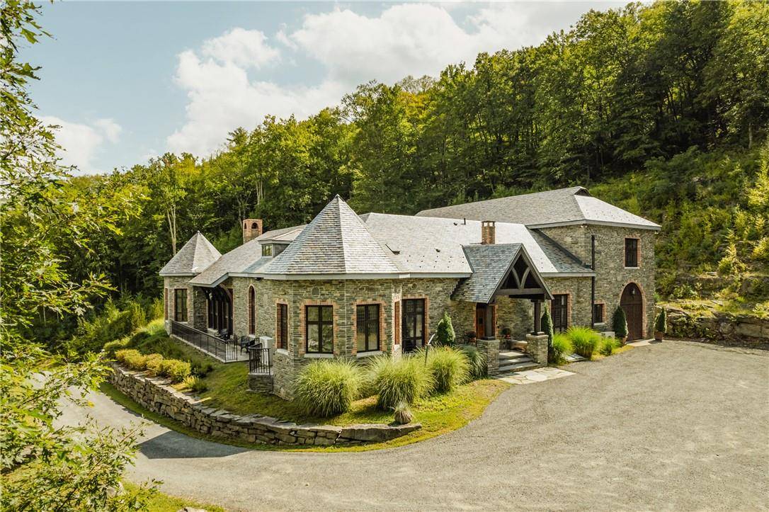 Welcome to Painter Hill Castle, a 300 acre estate with three distinct homes an Old World inspired castle, a guesthouse, and a vintage stone cottage.
