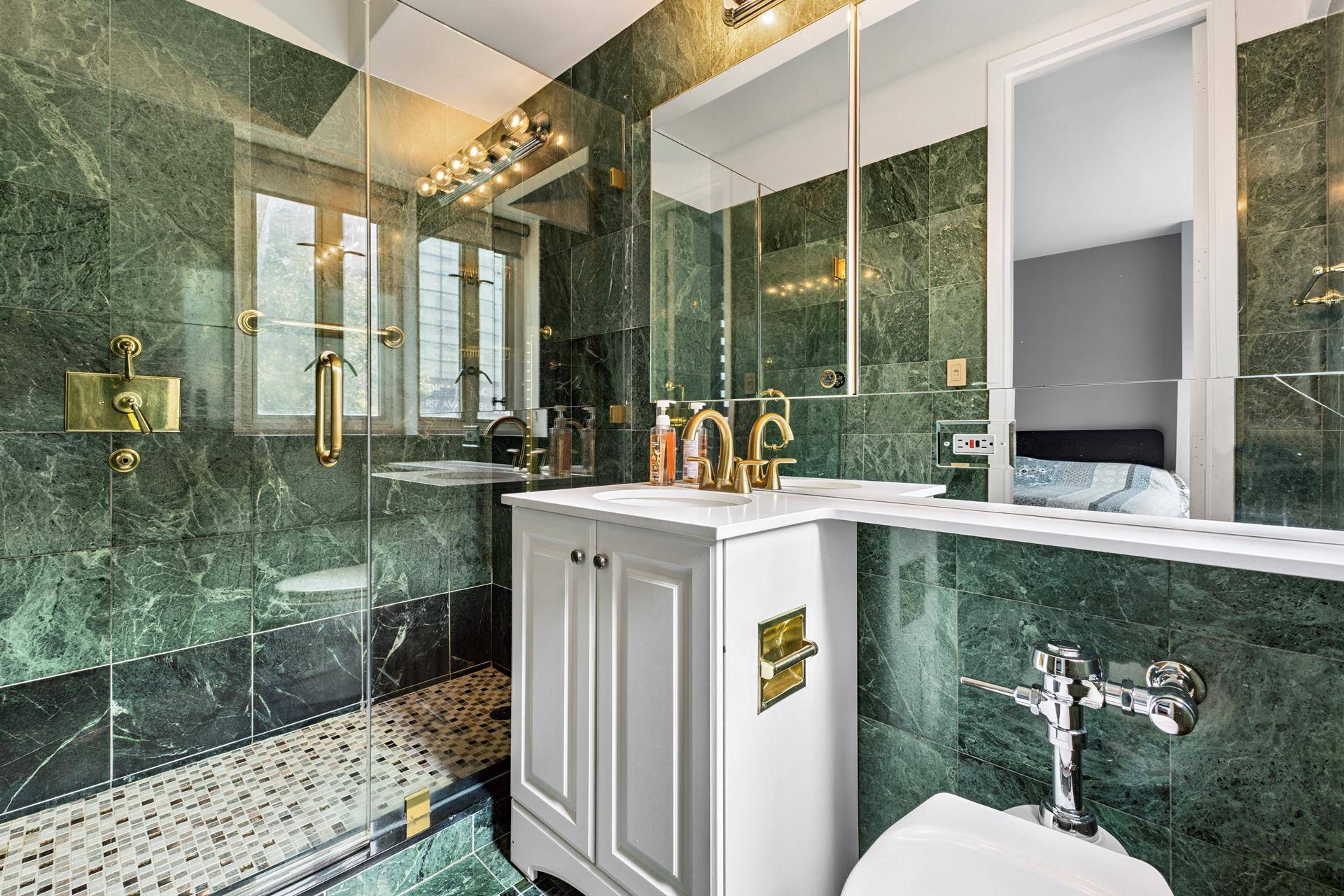 This beautiful corner residence combines classic prewar charm with modern functionality, offering an exceptional three bedroom layout rarely available in the building.