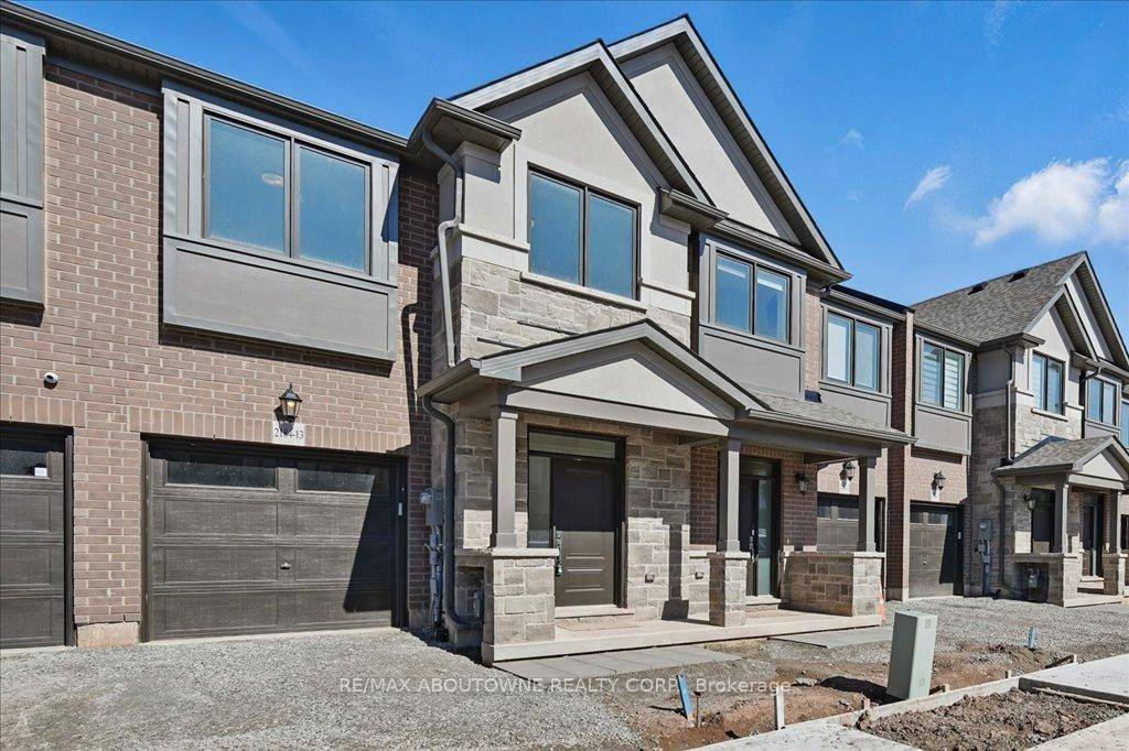 ABSOLUTELY STUNNING ! ! Brand new Branthaven 2 story executive townhouse, situated in a family friendly mature enclave in the sought after Westmount neighbourhood.