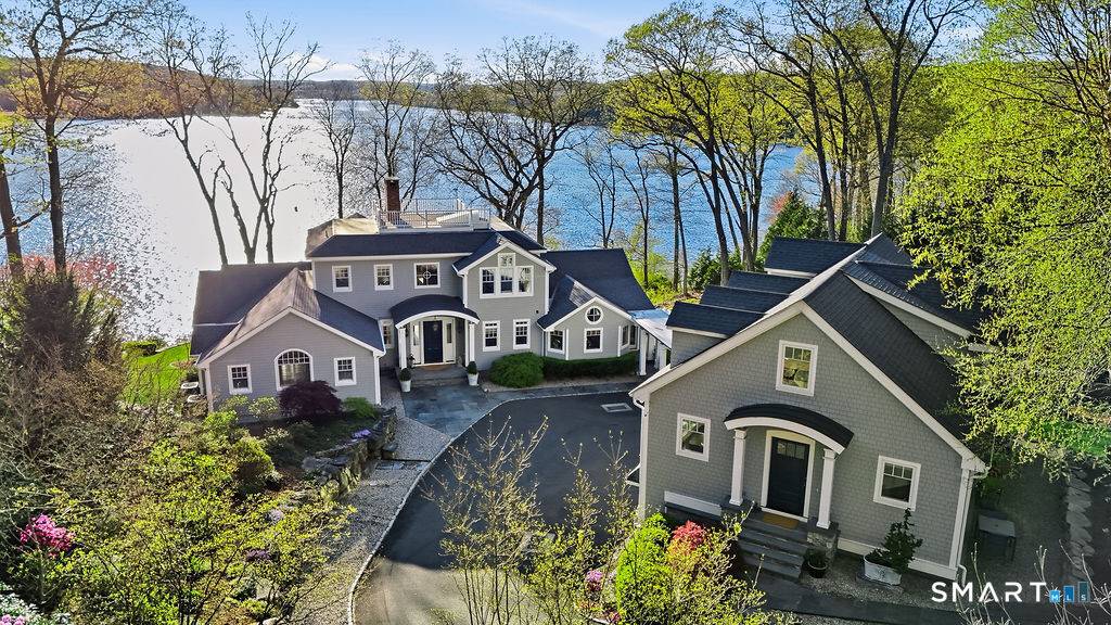 Perched above the CT River with breathtaking panoramic views and unforgettable sunsets from every room, this extraordinary waterfront compound is the definition of luxury coastal living.