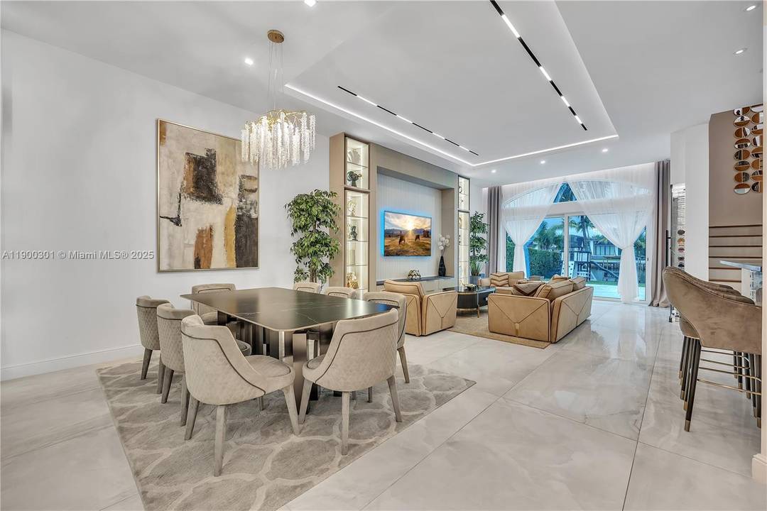 Experience the epitome of waterfront luxury living in this exquisitely furnished designer residence.