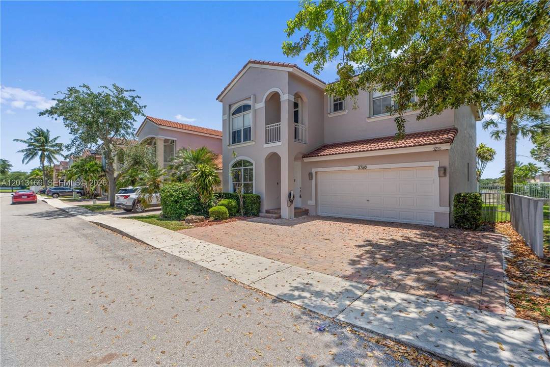 Beautiful lakefront home located in the highly desirable gated community of Maple Ridge in Hollywood.
