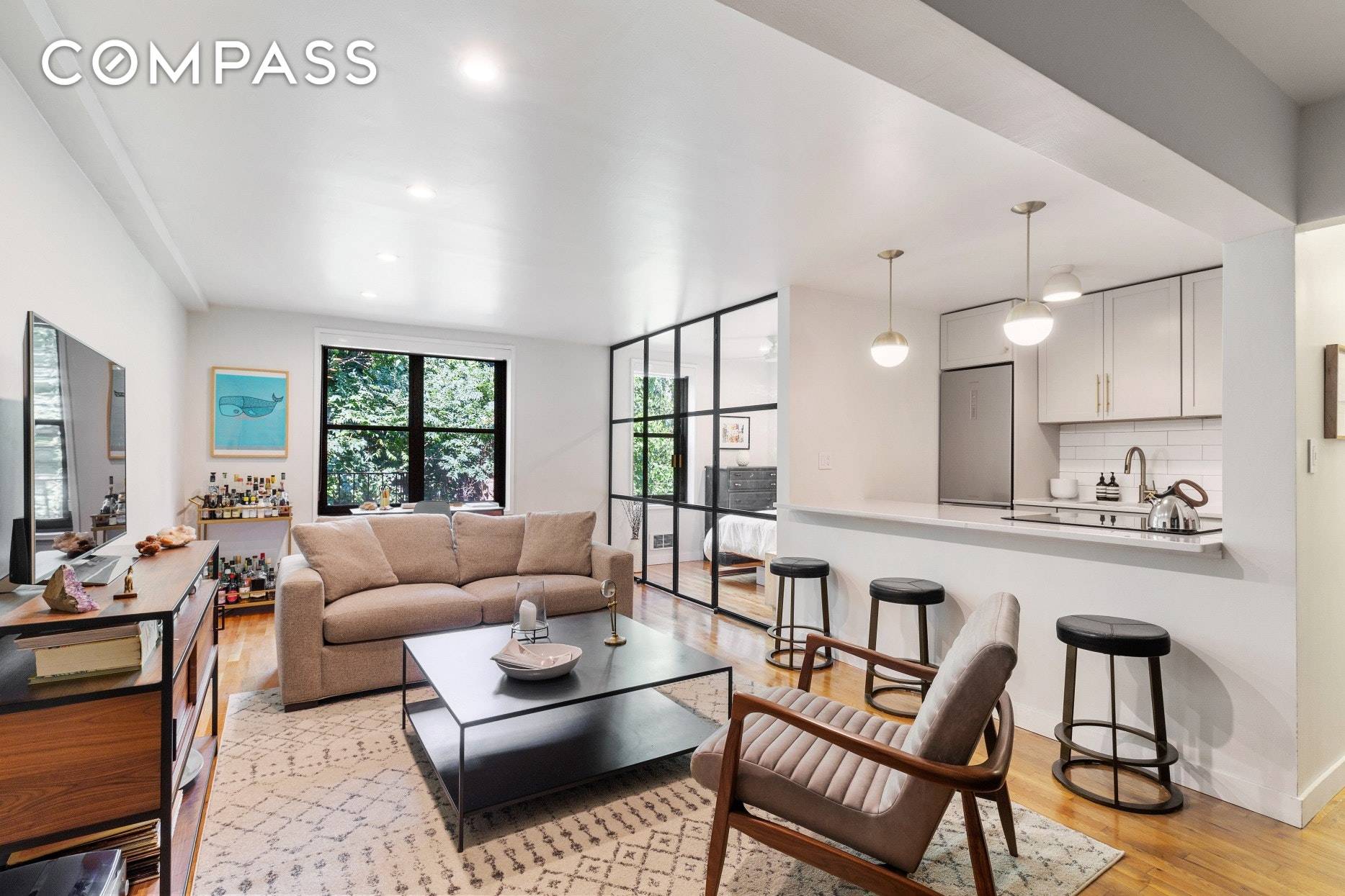JAW DROPPING JR 4 IN HUDSON HEIGHTS Sleek, sophisticated and renovated to absolute perfection, this modern masterpiece is nestled quietly overlooking a majestic cliff with lush greenery.