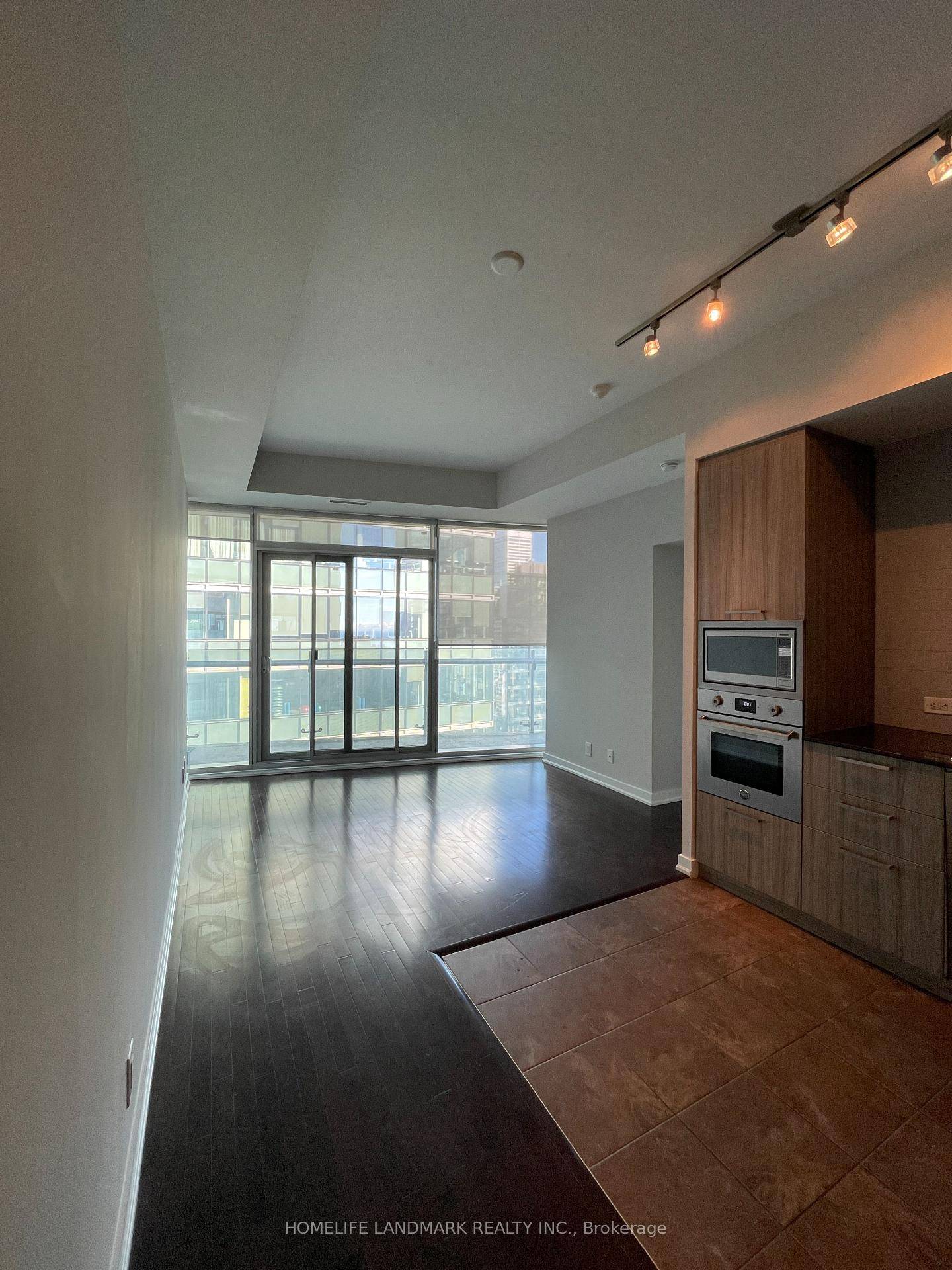 Stunning 1 Bedroom Den Unit with Parking and Locker at Ice II.