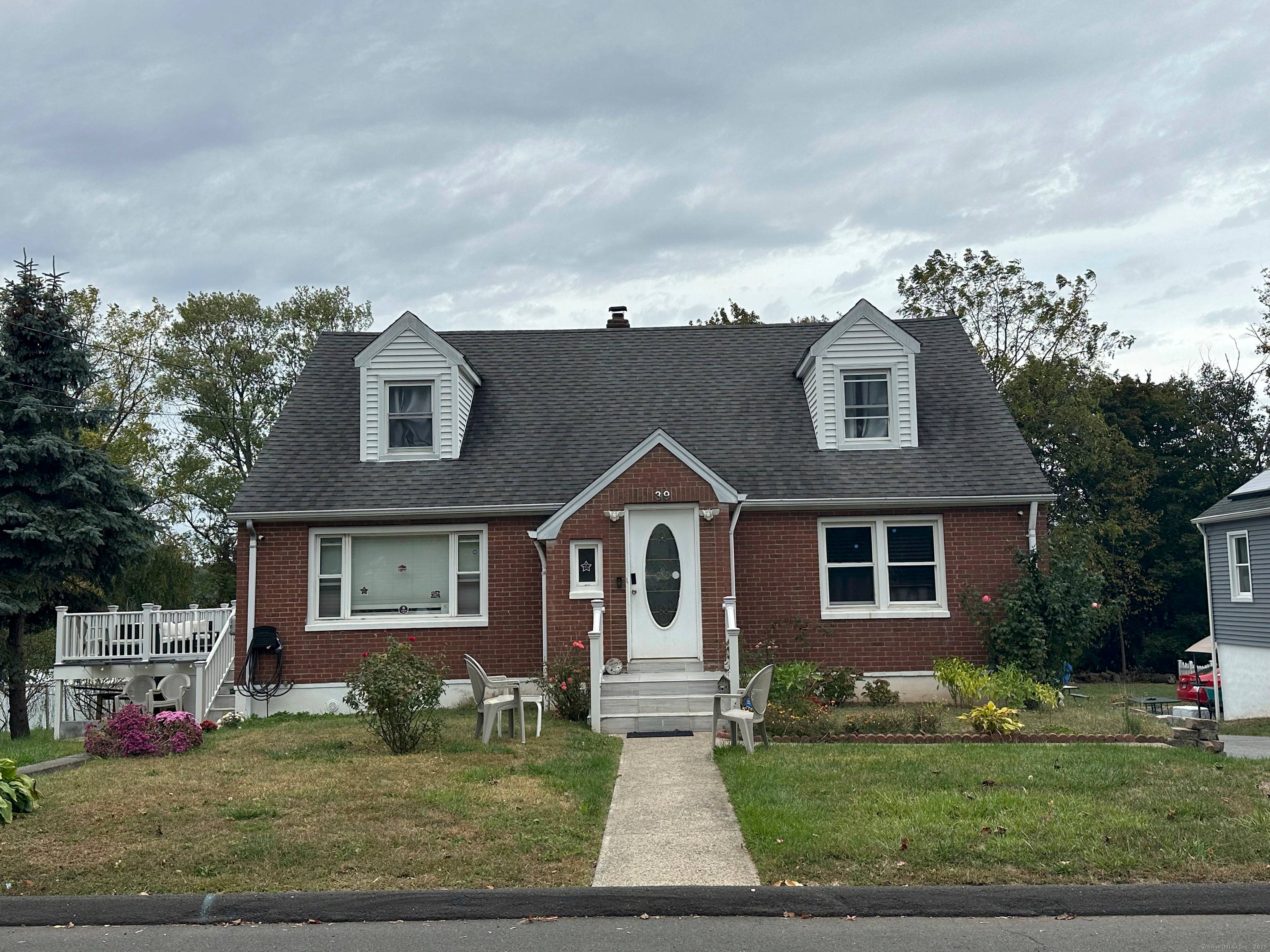 Welcome to 39 Draper Ave, Meriden, CT 06450 a beautifully renovated 1950 brick home that perfectly balances timeless craftsmanship with modern comfort.