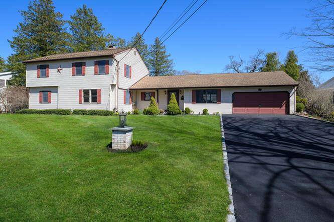 Welcome to this impeccably maintained and updated 6 bedroom, 4.