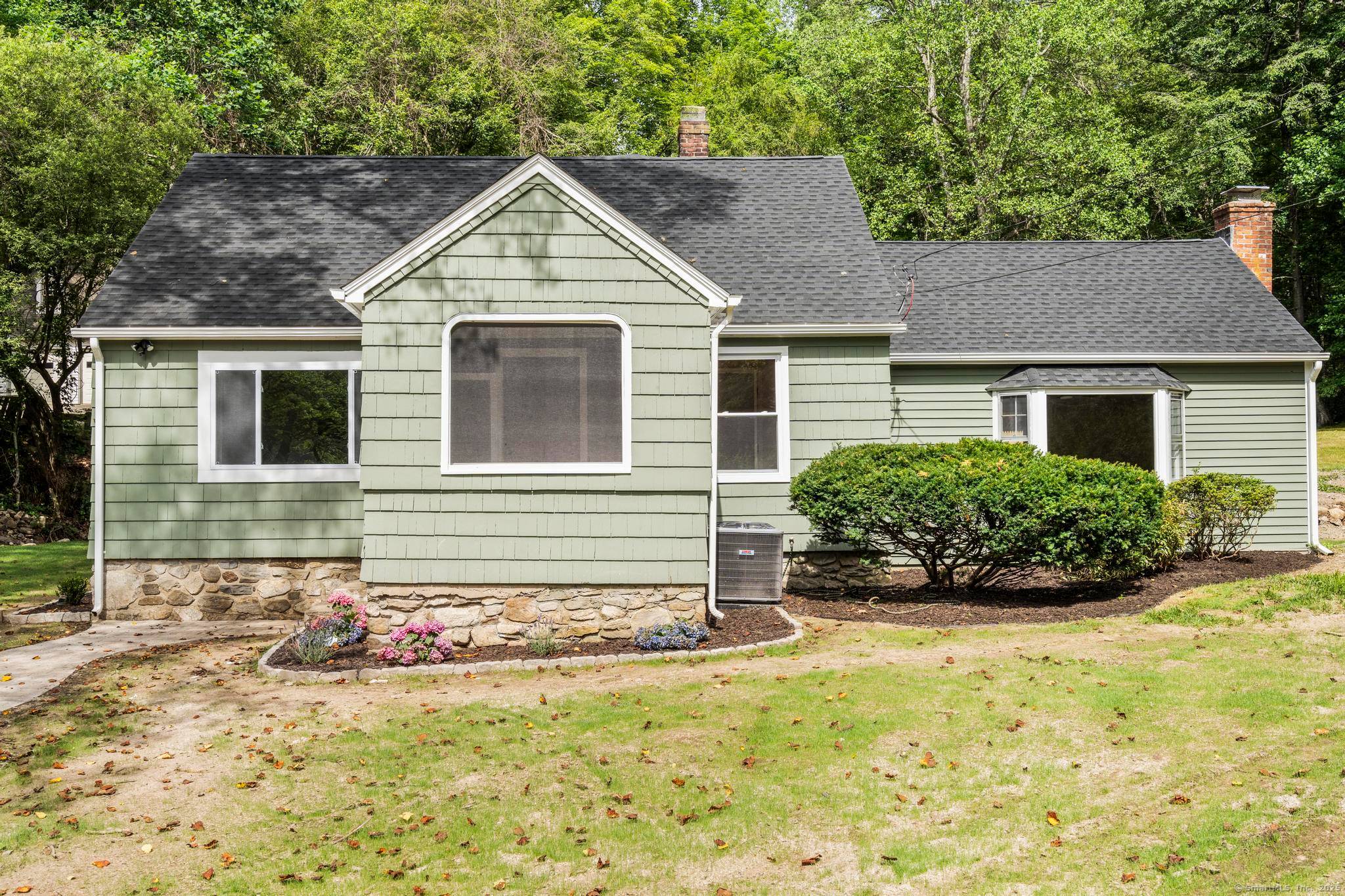 Step into modern comfort and timeless charm with this completely renovated home, perfectly nestled in a serene and quiet corner of Sandy Hook.
