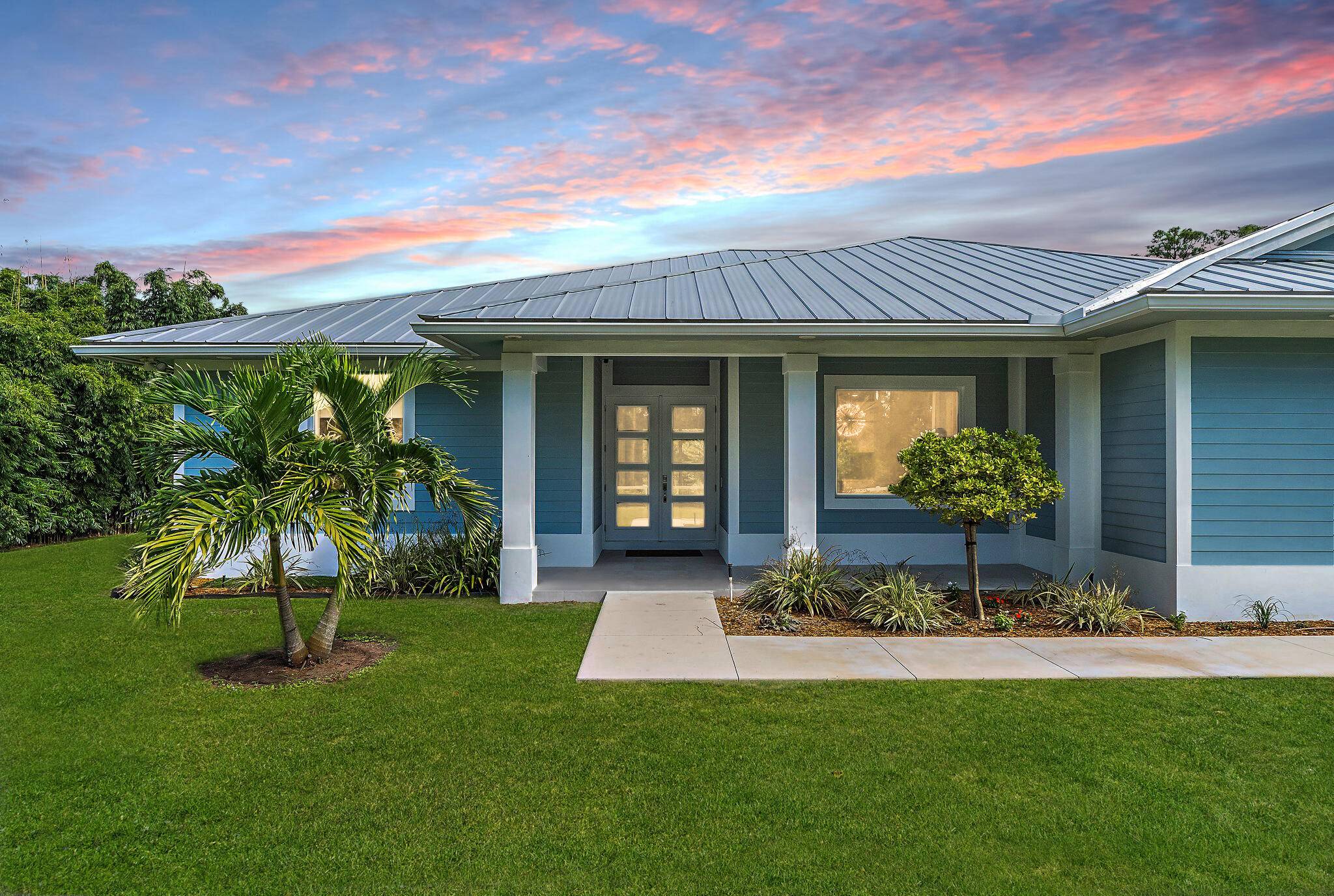 2022 CBS home on over an acre in Jupiter Farms with no HOA.