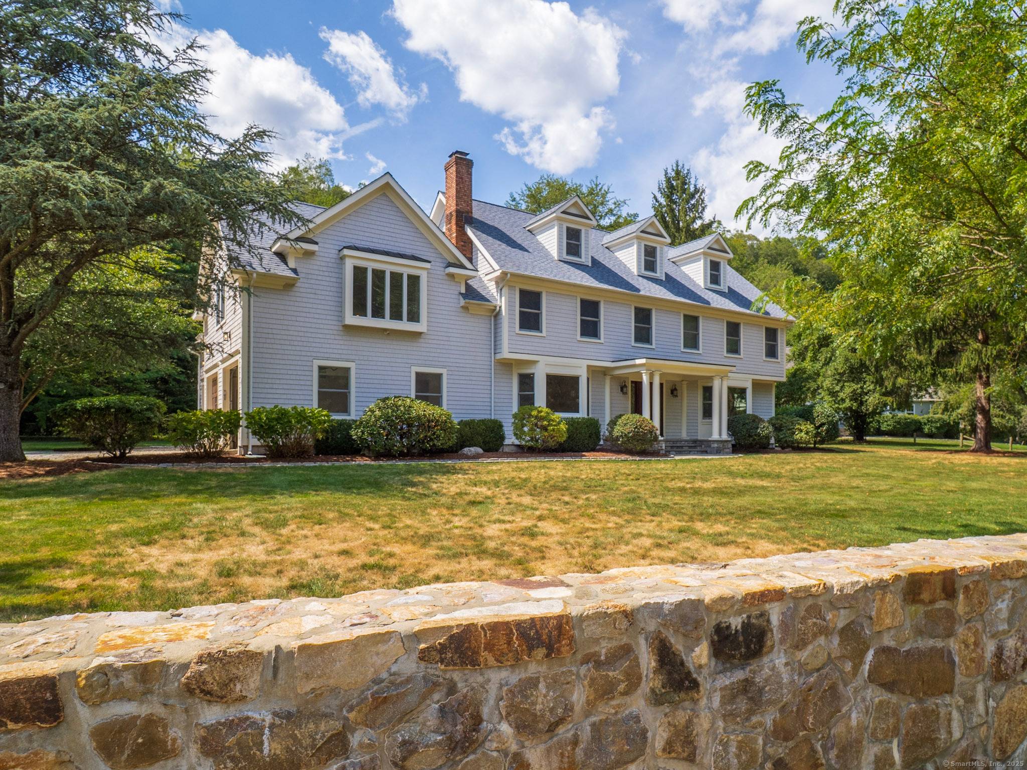 Conveniently located, set back from Danbury Road on a private driveway.