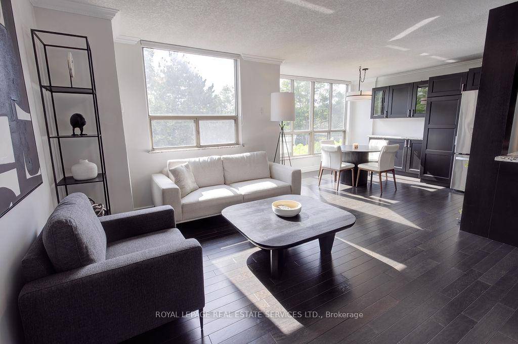 Perfect executive rental in a bright, fully furnished corner unit.