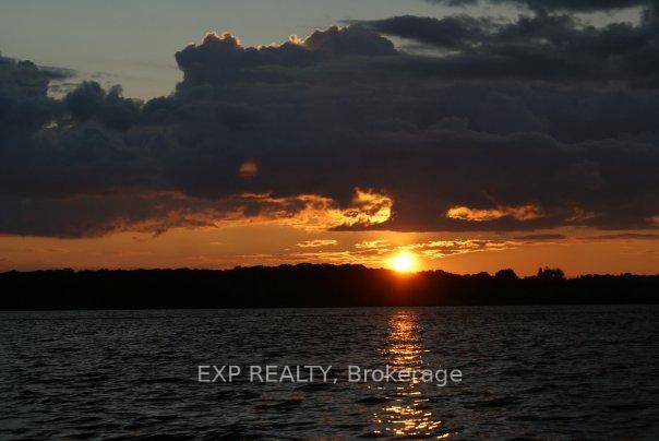 Welcome to your affordable lakefront escape on the peaceful shores of Lake St.