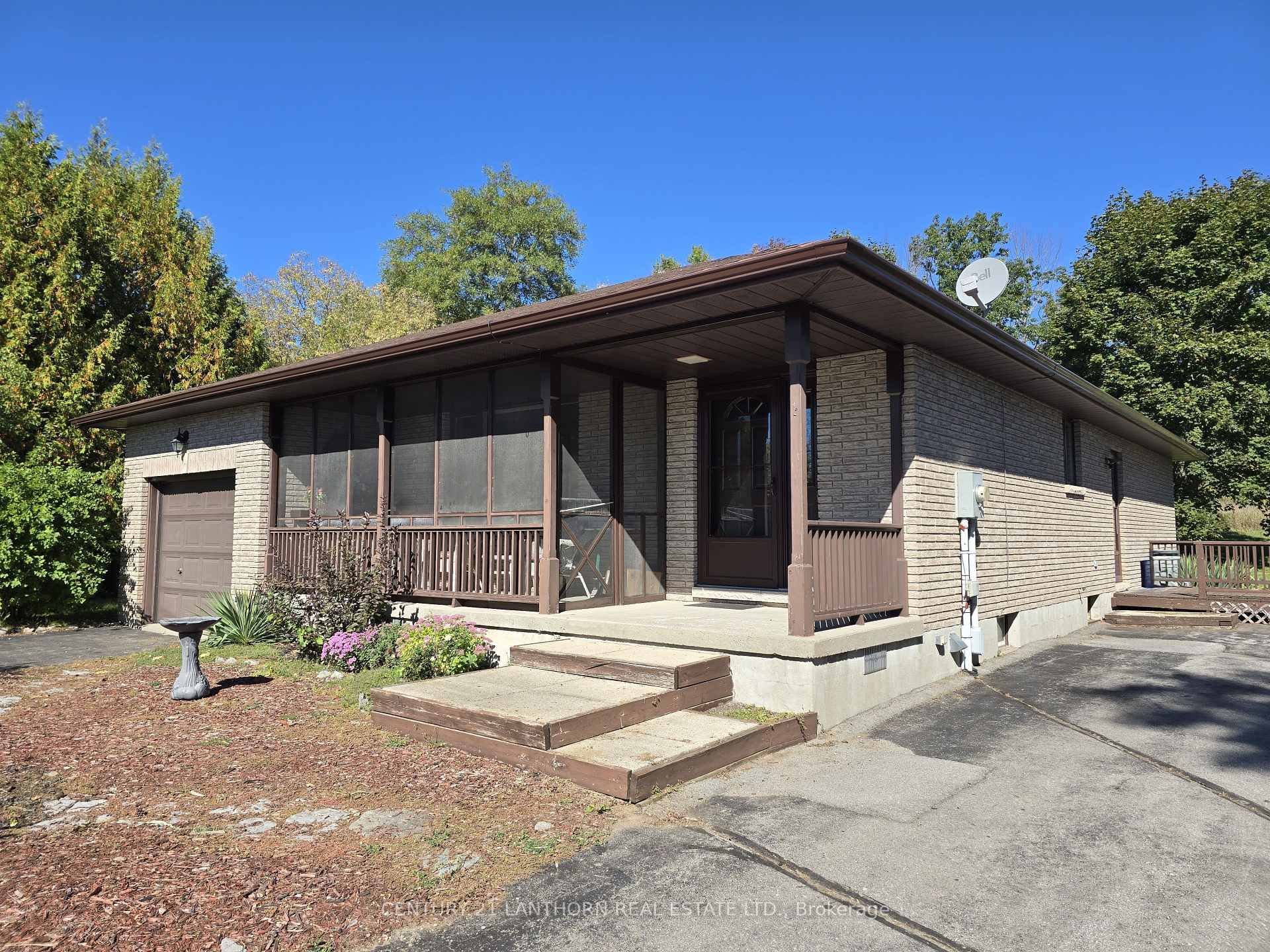 LOVELY and privately situated RURAL HOME and LARGE ACREAGE of LAND in the gorgeous Oak Hills just south of the quaint village of Stirling.