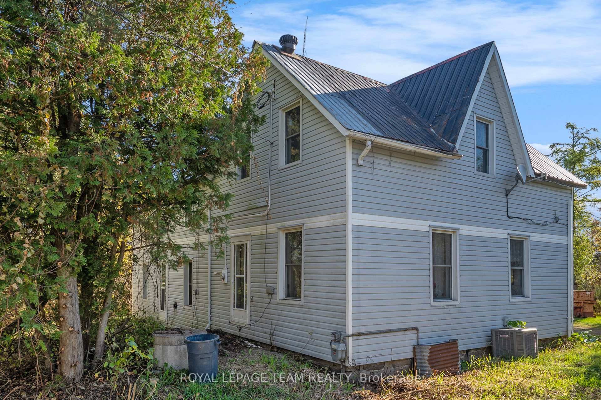 Investigate this rural opportunity on five acres !