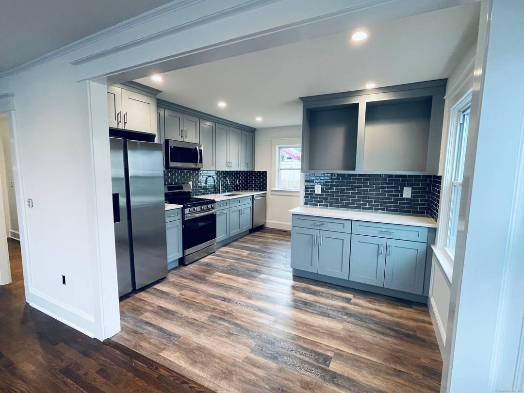 This charming, renovated four bedroom, two full bath home is nestled in the heart of Norwalk, offering both comfort and convenience.