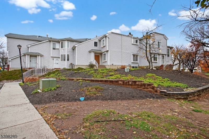 BACK ON MARKET ! Welcome to The Commons at Piscataway, a highly desirable community featuring a playground and tennis court.