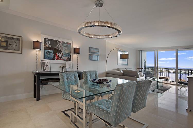 Waterfront living at its best, this chic sunny 1bedroom 1 1 1 bath condo has a coveted direct southeast intracoastal view.