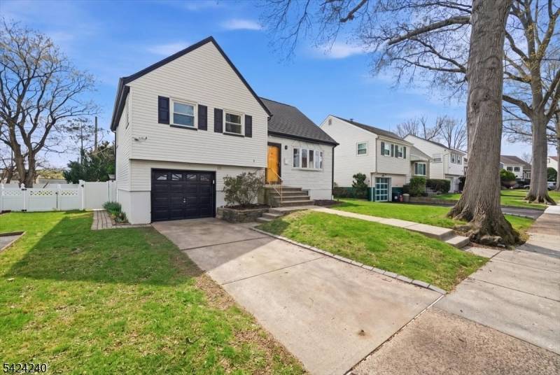 Welcome to this well maintained split level home nestled on a quiet, tree lined street in desirable Bloomfield.