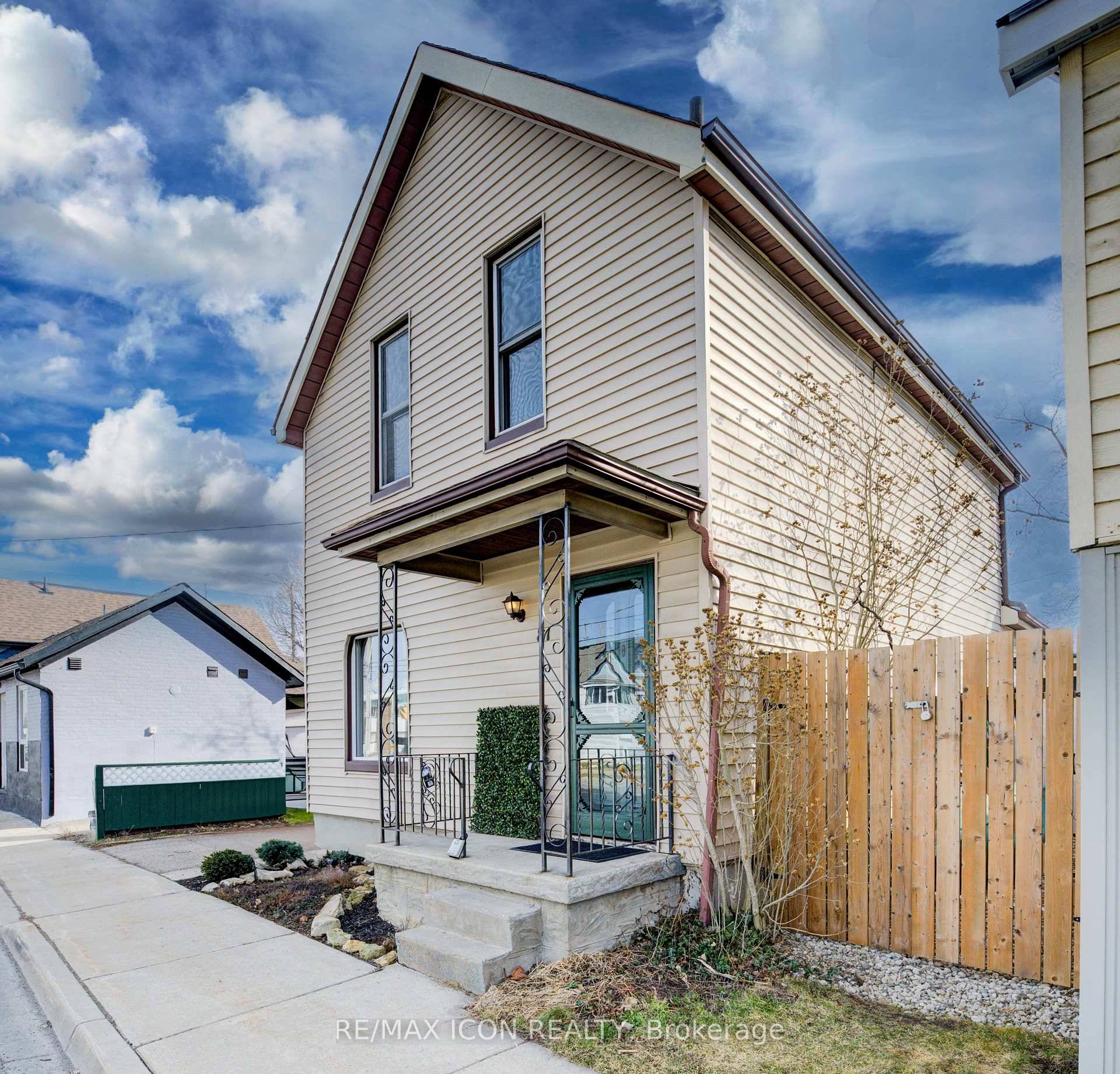A genuinely charming Cambridge home, steps from the Grand River, with a bonus of R5 Zoning.