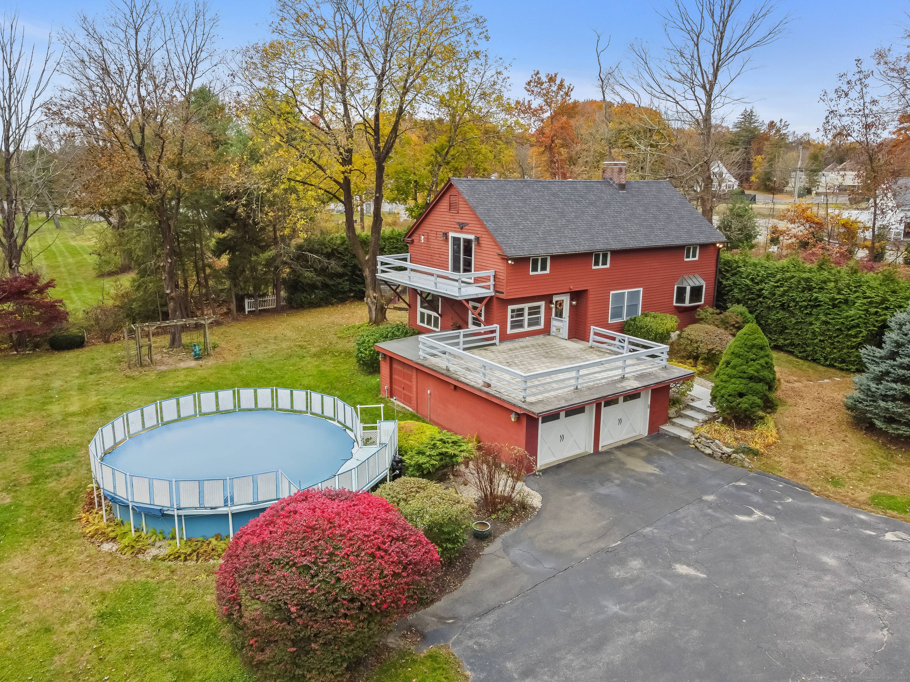 Are you seeking a dreamy early 20th century home with vintage charm, impressive acreage, partially finished lower level, and an unparalleled location ?