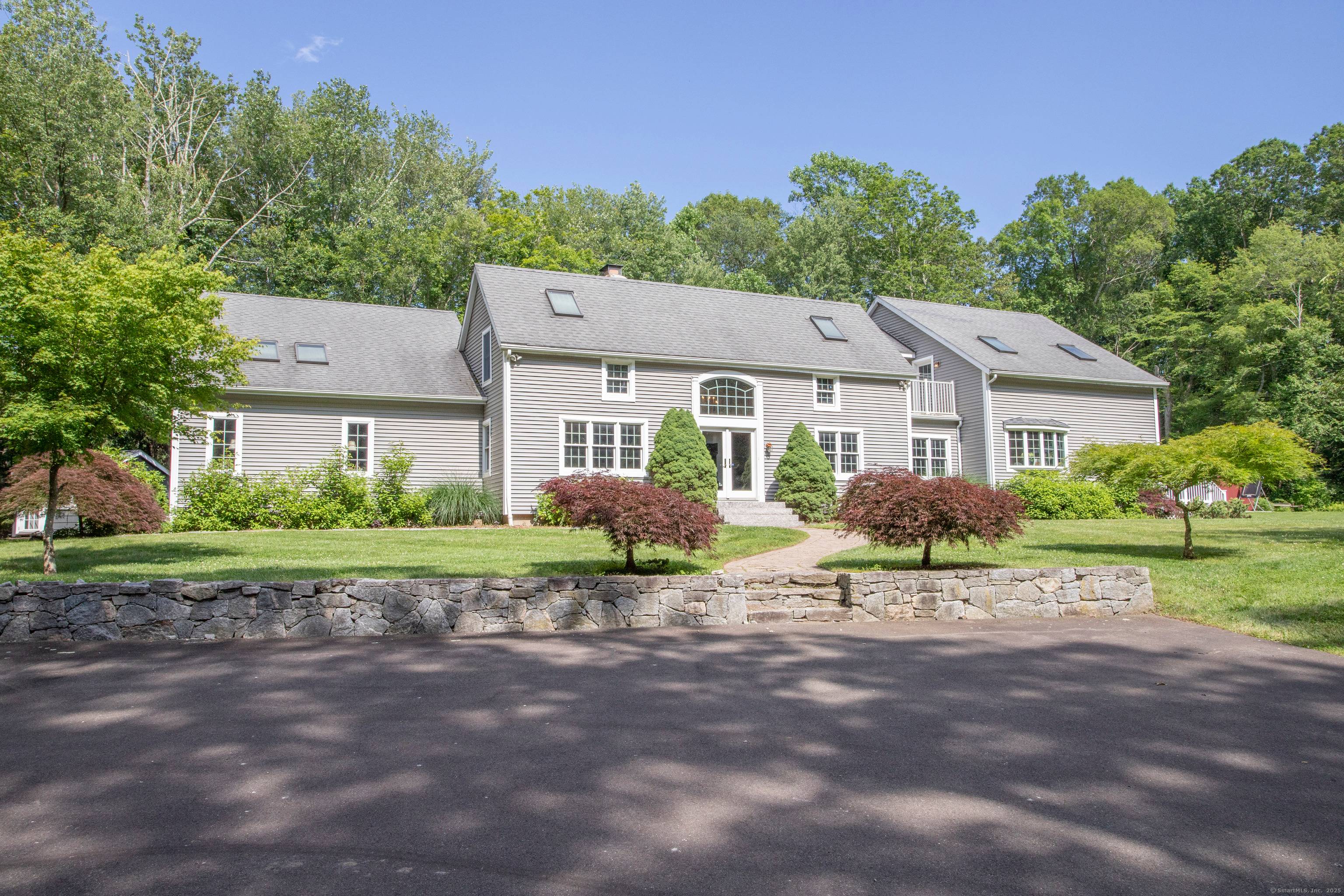 Tucked away in complete privacy, this stunning post and beam home offers a rare opportunity to live in harmony with nature.