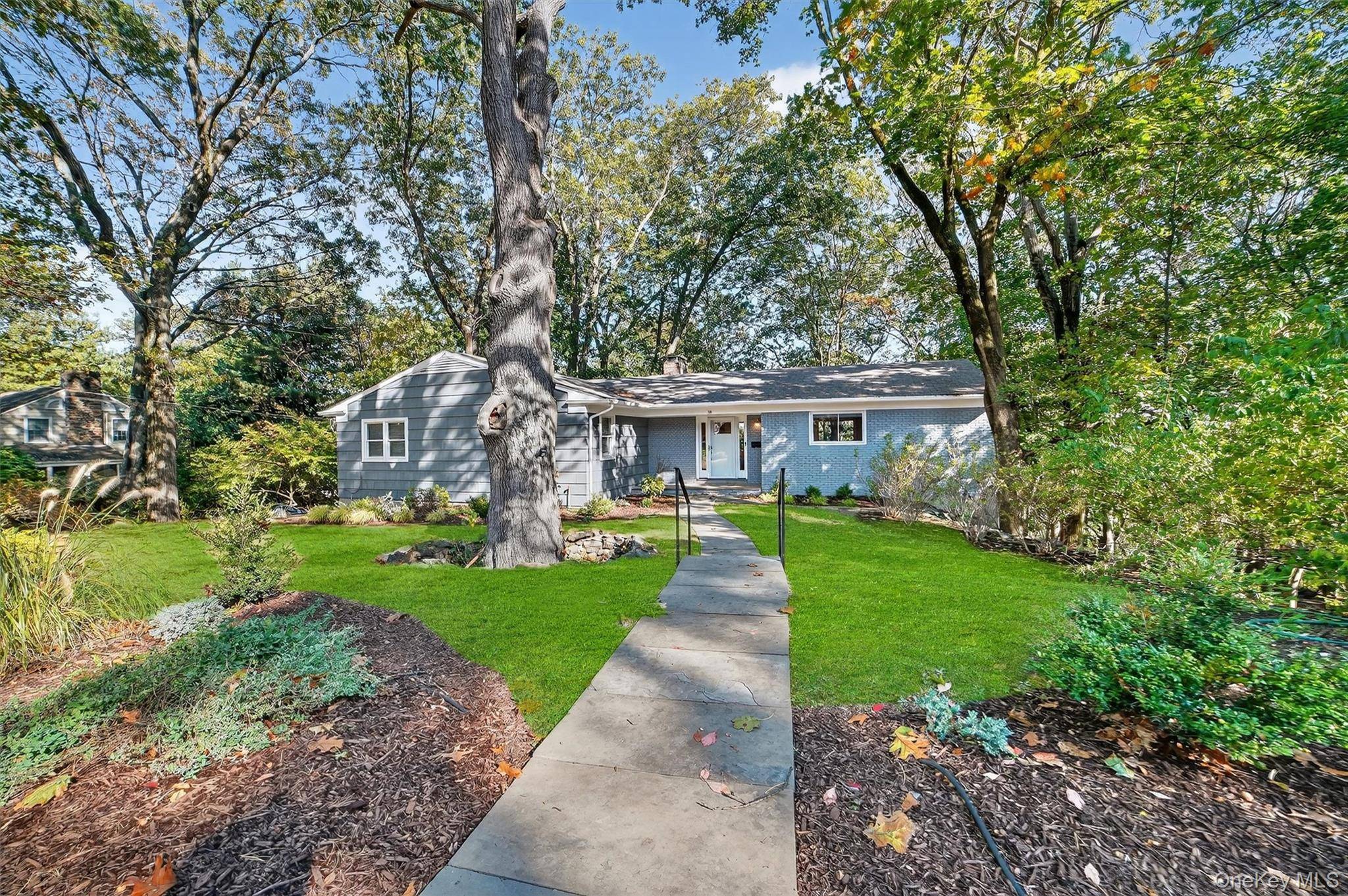 Surrounded by lush greenery and peaceful natural beauty, this sophisticated Contemporary Ranch offers the perfect blend of modern comfort and tranquil living just steps from the 76 acre Juhring Nature ...