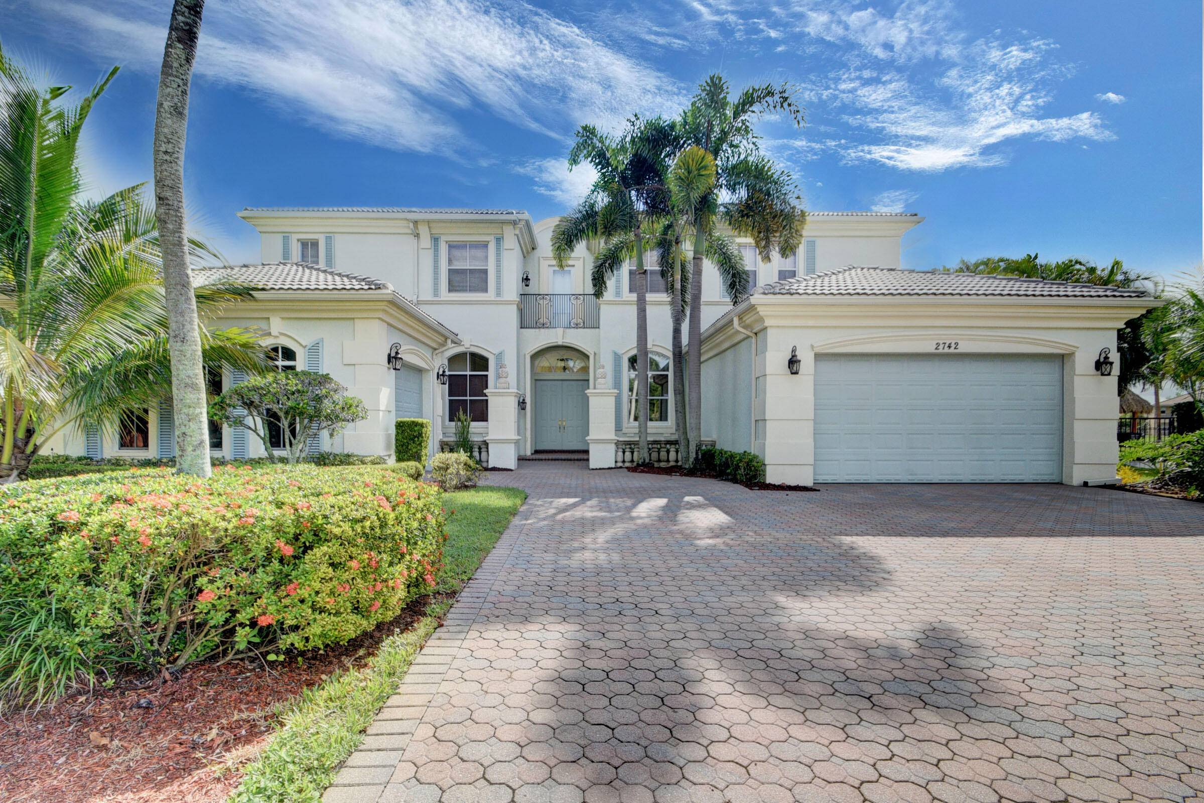 Nestled within the embrace of a tropical paradise in Florida, this Mediterranean inspired residence stands as a regal testament to luxury living.
