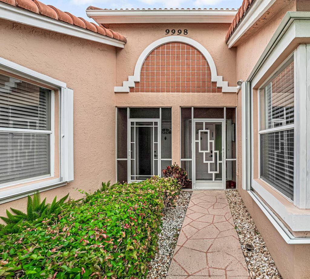 Beautifully maintained villa in the highly sought after 55 community of Palm Isles in Boynton Beach.