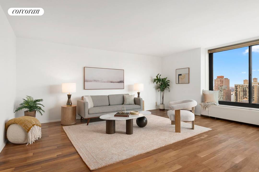 Expansive wrap around views and light fill this beautiful 1BR 1BA Carnegie Hill condo.