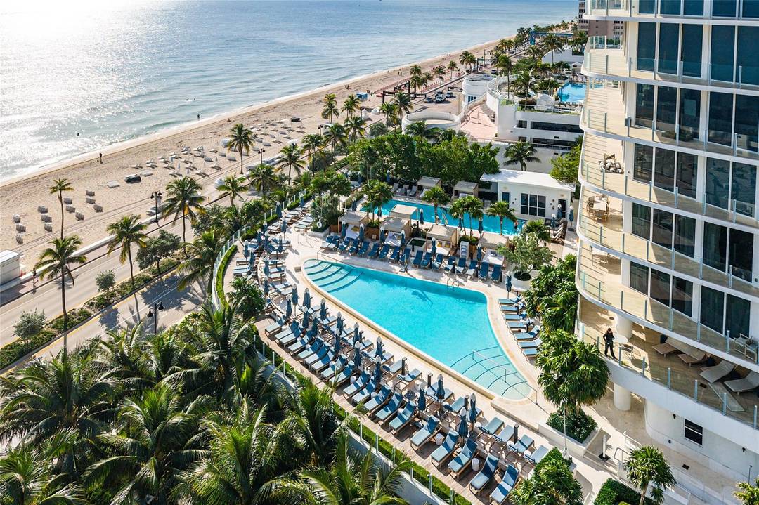 An exceptional Four Seasons oceanfront residence with a rare, adaptable layout that extends beyond a traditional three bedroom offering.