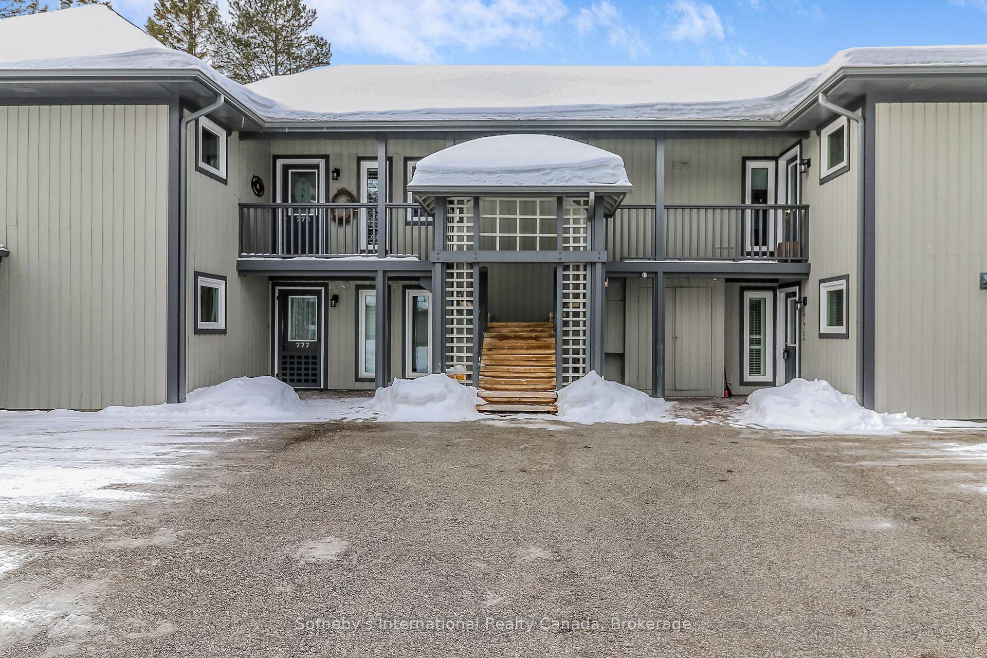 Totally renovated ground floor garden home with garage in amenity rich Lighthouse Point.