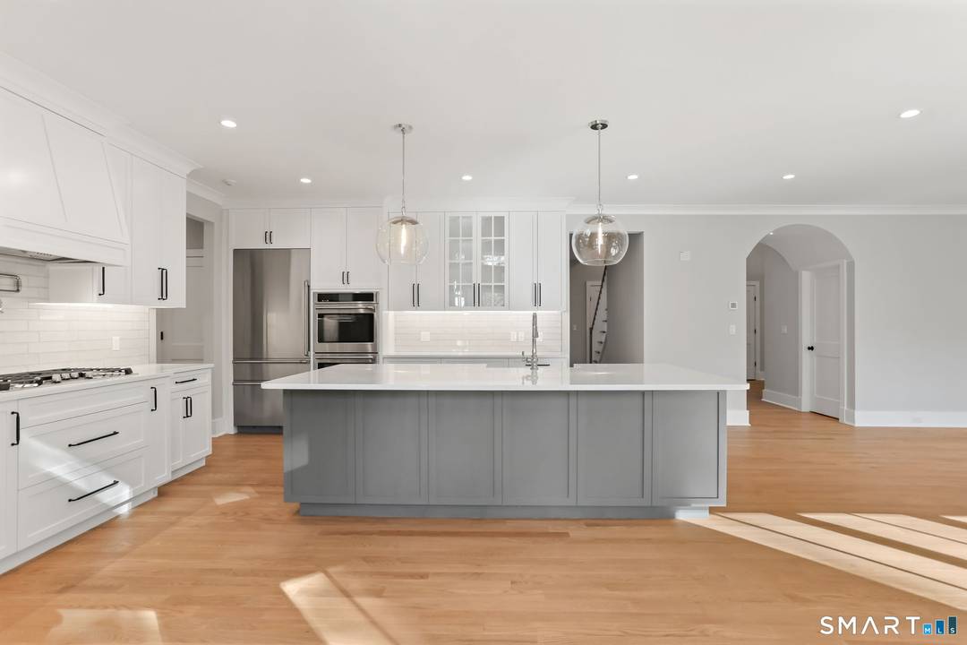 31 Rosano Road is a fully completed new construction set at the end of a cul de sac in Stamford's established Mid Ridges.