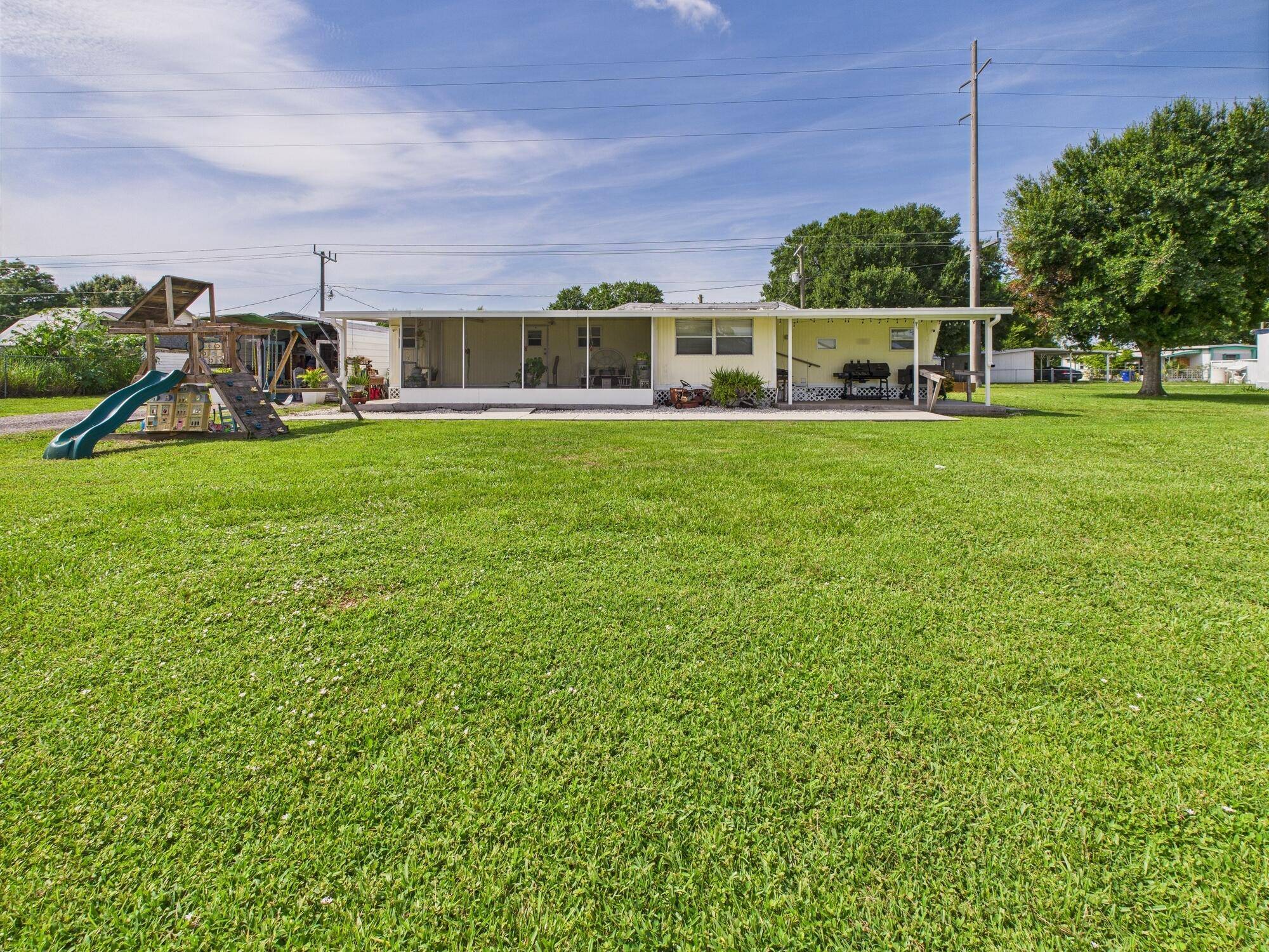 Full of Southern charm, this 2BD 2BA home in Kissimmee River Estates is a unique find just 1.
