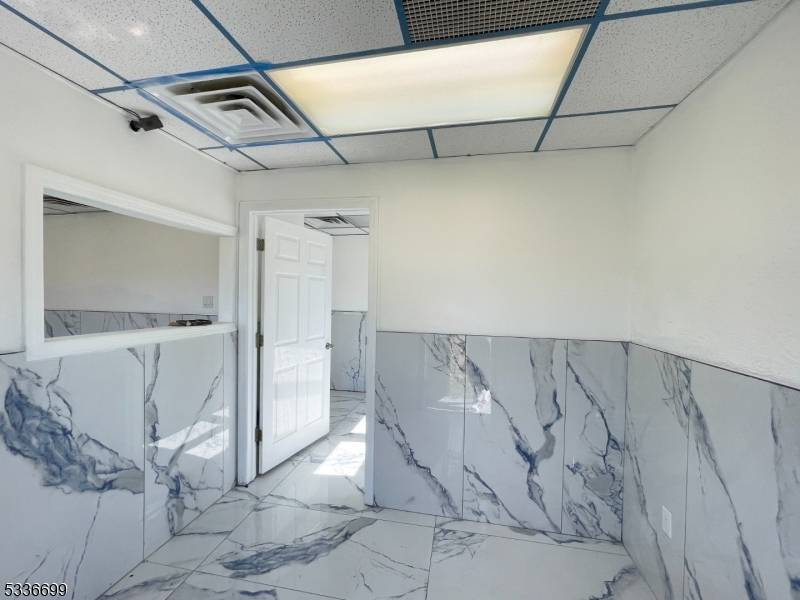Prime commercial property in a high traffic area, perfect for retail, office, or service businesses.