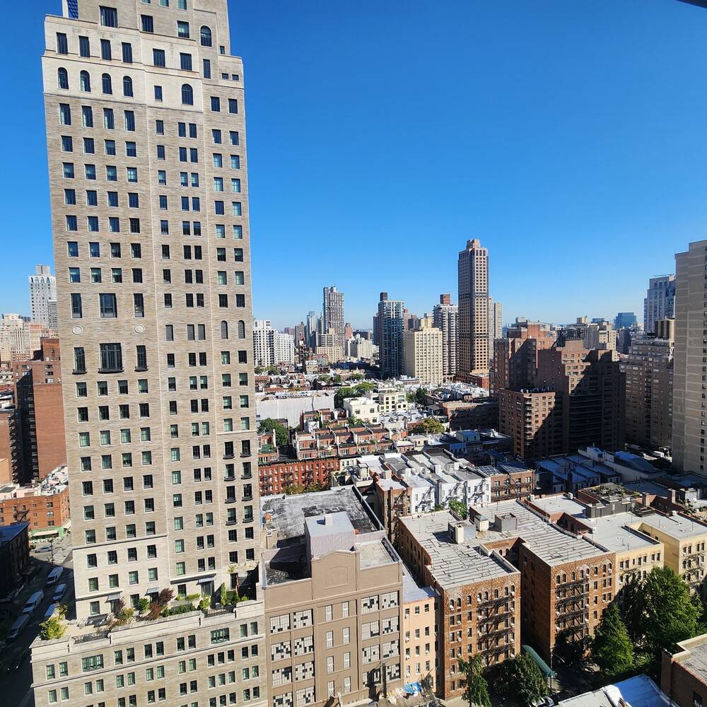 Large 1 Bedroom at The White Glove Condominium, Wood Floors Throughout Moldings, Renovated Kitchen ALL NEW stainless steel appliances to be installed as well, with Custom Wood Cabinetry and Stone ...