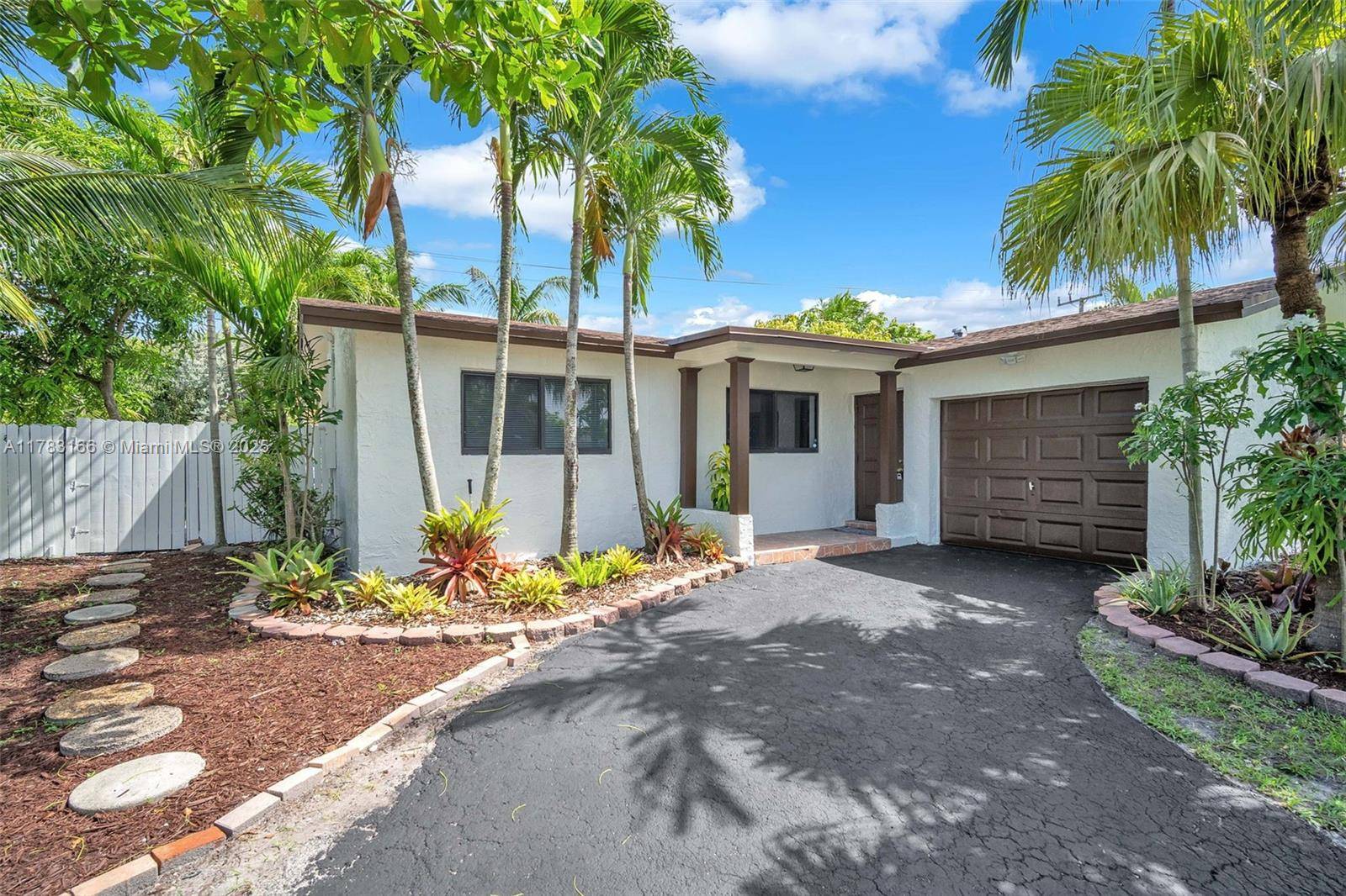 Discover this charming 3 bedroom, 2 bathroom home in Sunrise, Florida, open floor plan.