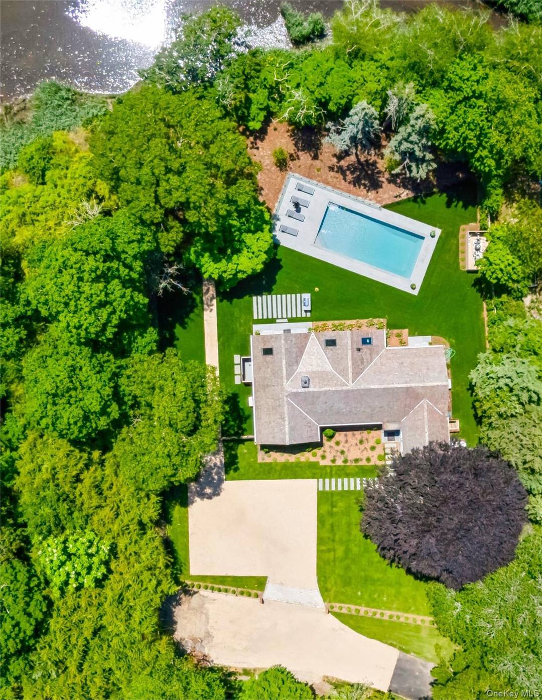 16 Walker Court, East Quogue, Luxury Waterfront Living Meets Modern Design !