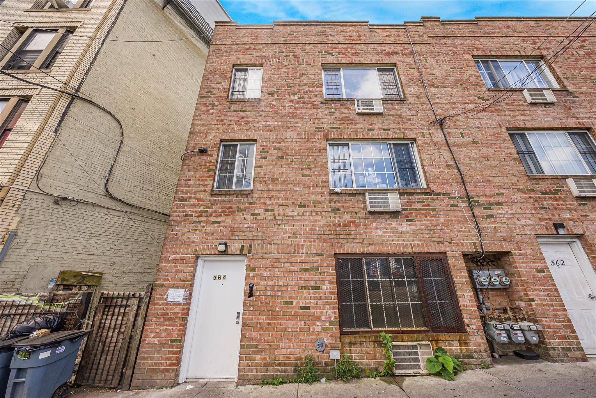 Exceptional Investment Opportunity Three Family Brick Home in Grand Concourse Village Introducing a rare find in the heart of Grand Concourse Village a solidly built, three family brick residence featuring ...
