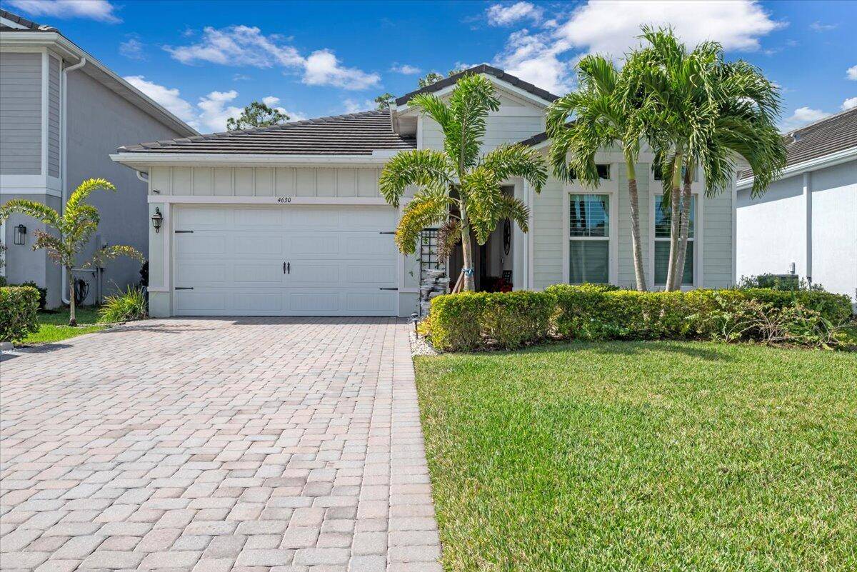Nestled in the heart of Stuart, this stunning home offers the perfect blend of modern design and serene natural surroundings on a private cul de sac.
