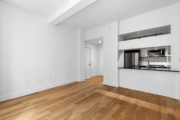 This renovated FiDi loft offers modern finishes, superb views, and exceptional light.