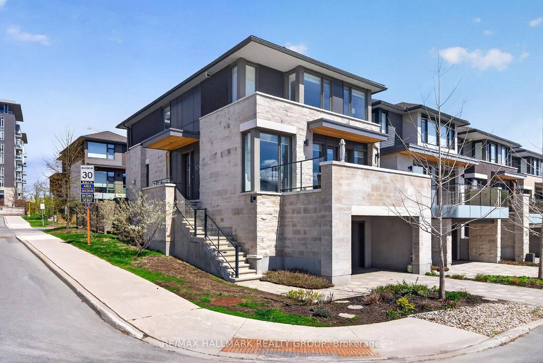 Welcome to 30 Telmon, an exceptional EQ Homes residence in the heart of Greystone Village, thoughtfully designed by acclaimed architect Barry Hobin.