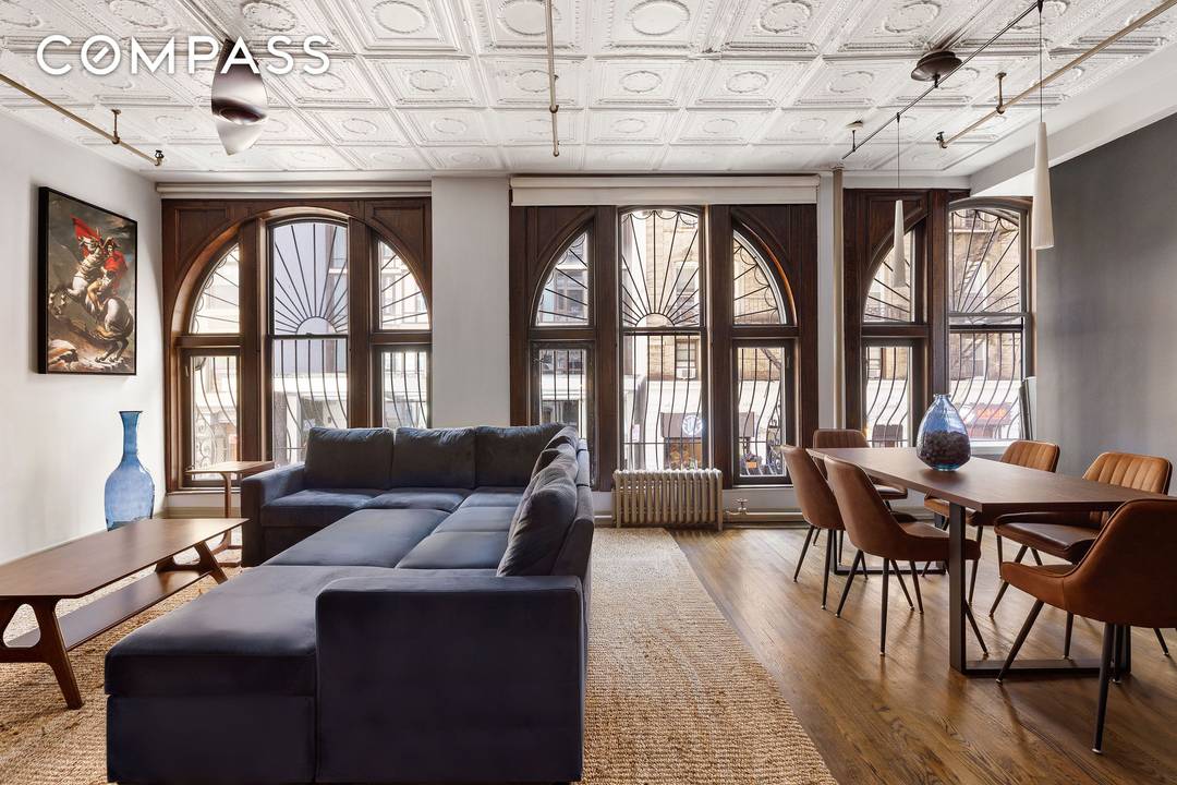 Own an authentic Chelsea loft in the heart of the historic Flower District.