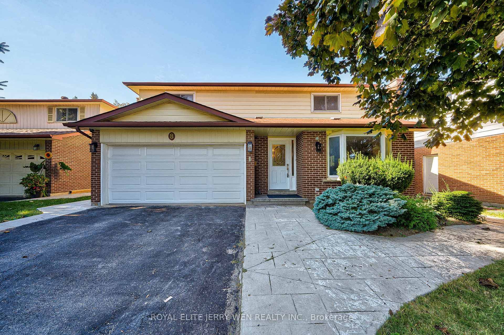 4 2 bedroom, 4 bathroom detached home with a double garage and wide frontage on a spacious lot offering exceptional curb appeal and extra outdoor space.
