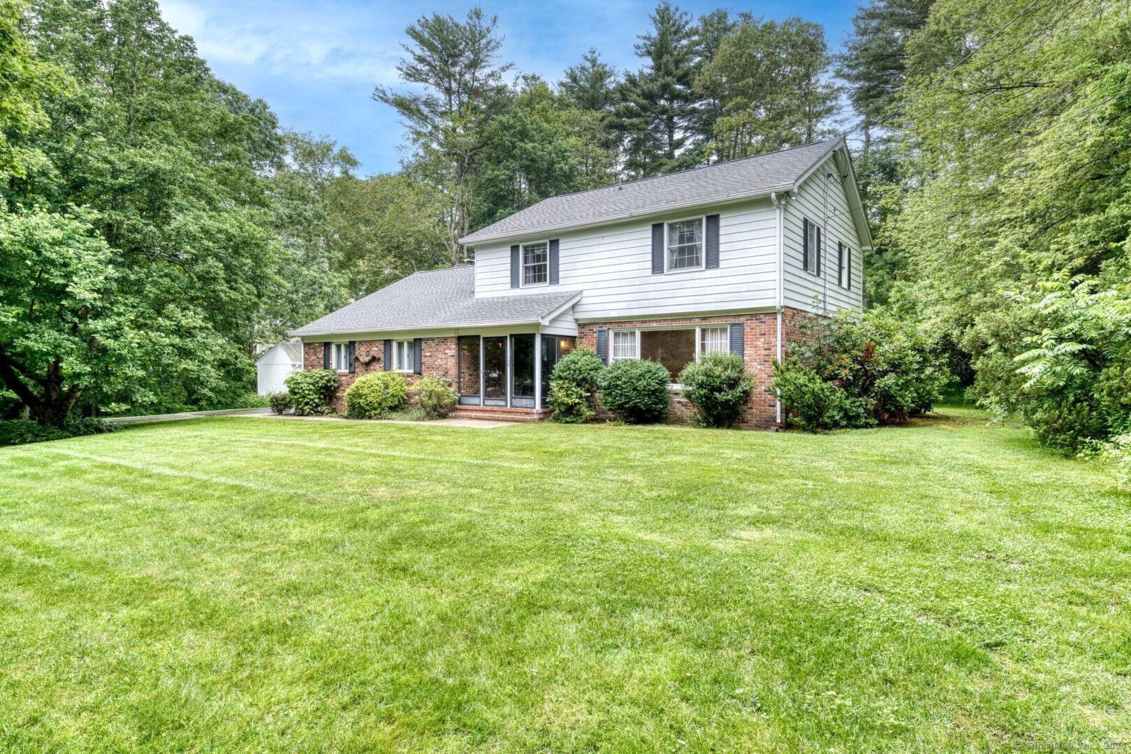 Welcome to 126 Grandview Terrace a stately Colonial with classic brick exterior, nestled on nearly an acre in beautiful, rural Brooklyn !