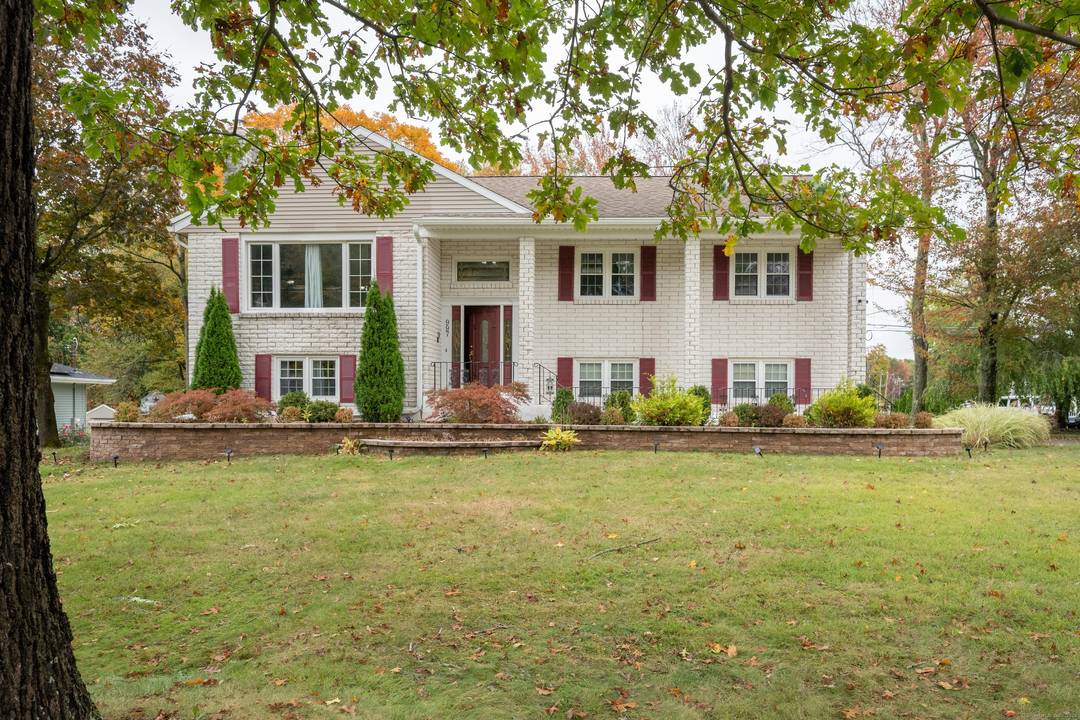 Spacious well maintained raised ranch on well manicured level corner lot waiting for its new owner to enjoy.