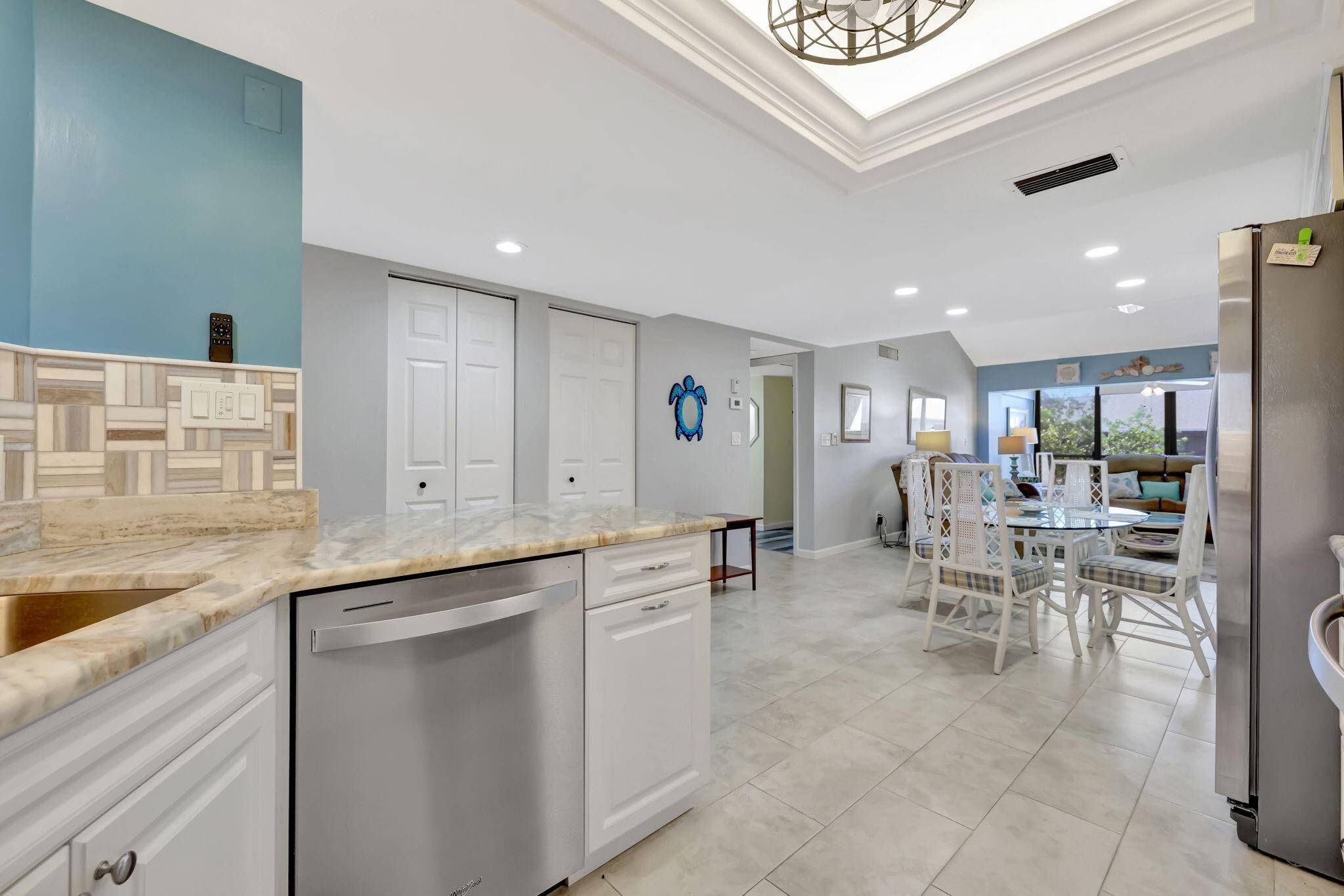 Enjoy extended living space with a versatile loft and serene pond views, complemented by the soothing sounds of the Atlantic.