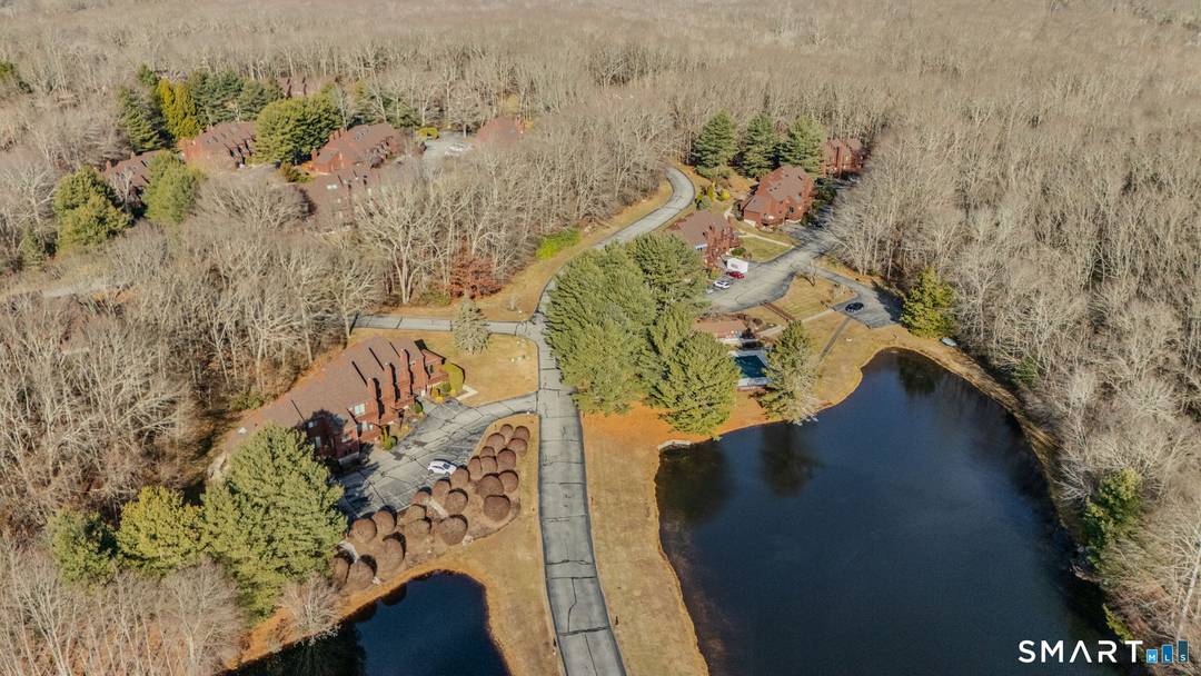 Welcome to your sun drenched end unit in the desirable Pond cliff complex.